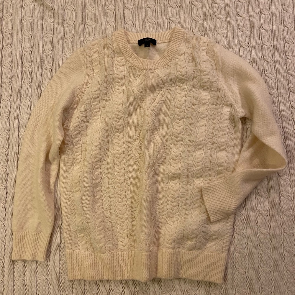 Cable knit sweater with fringe detail on front